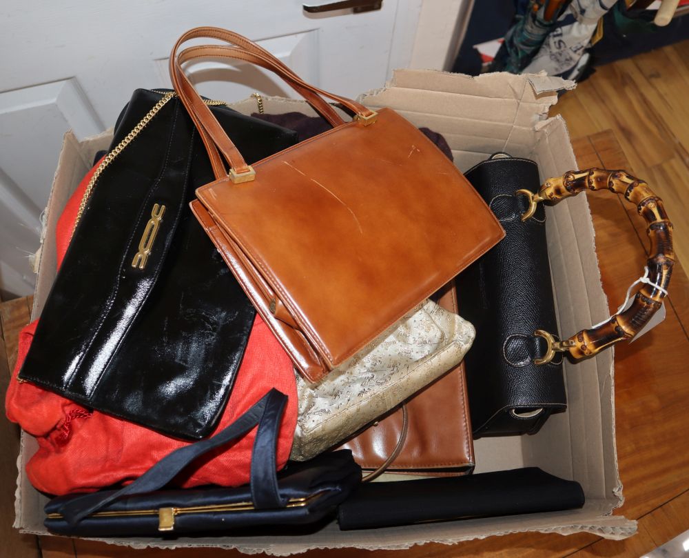 A collection of vintage handbags, including leather examples by Gucci, Rayne and Russell & Bromley